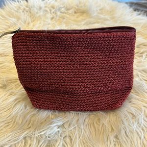 Woven material cosmetic case.